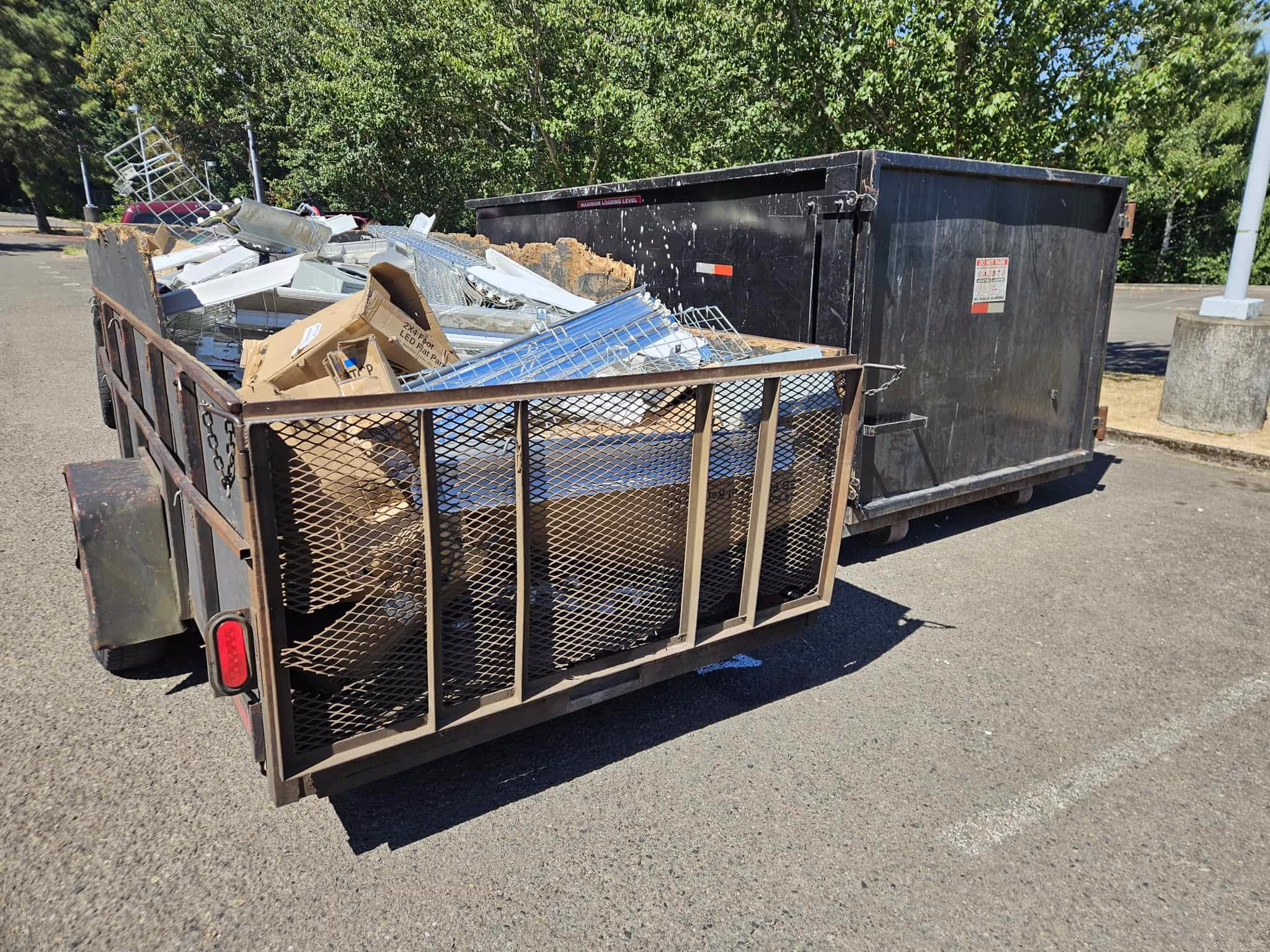 Trailer full of scrap metal after a commercial job